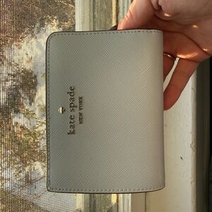 NWOT Kate Spade light blue Leather Wallet. Inside is light green.